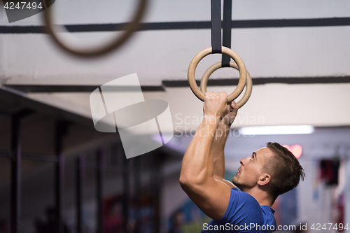 Image of man doing dipping exercise