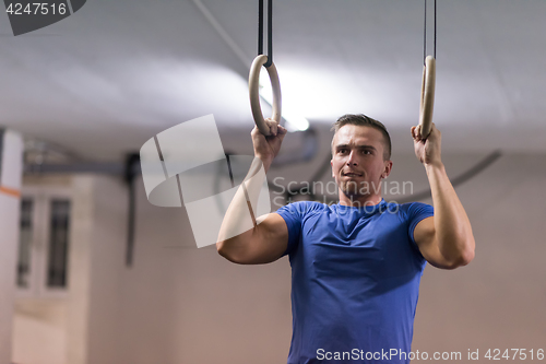 Image of man doing dipping exercise