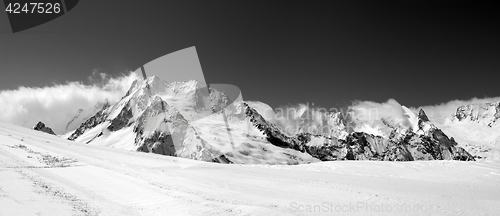 Image of Black and white panorama on ski slope and winter mountains