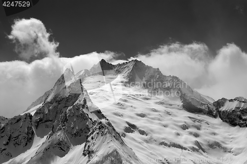 Image of Black and white view on mountain glacier covered with snow