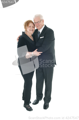 Image of Lovely senior couple hogging.