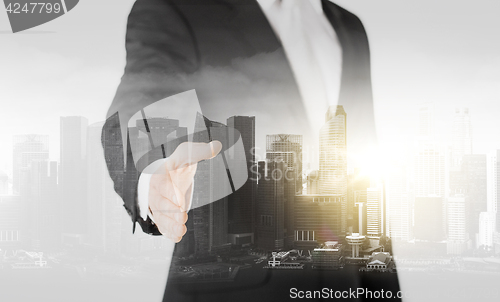 Image of businessman with open hand ready for handshake