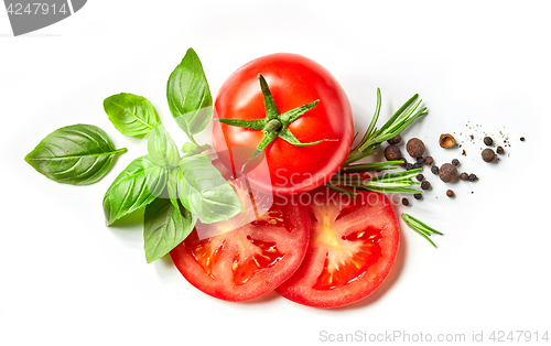 Image of fresh tomato, herbs and spices