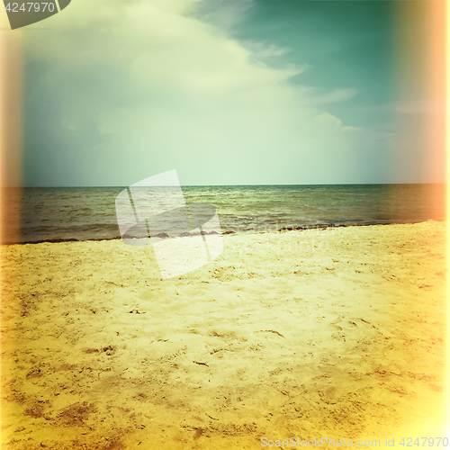 Image of Retro photo of sea and beach