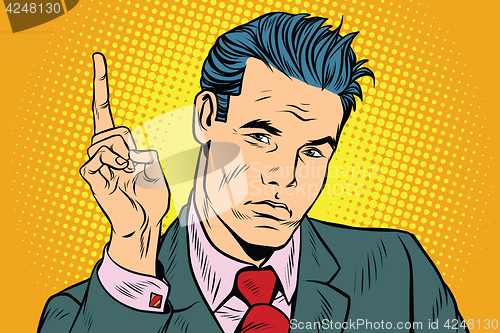 Image of businessman pointing finger up