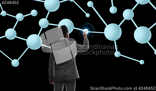 Image of businessman working with molecule formula