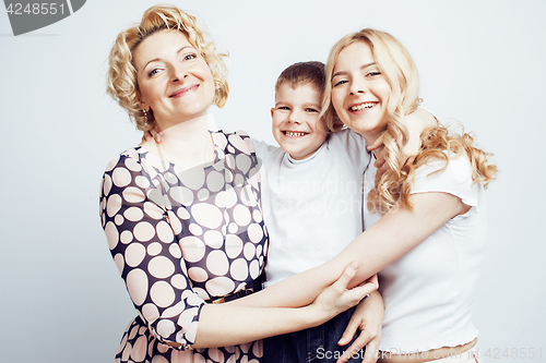 Image of happy smiling family together posing cheerful on white background, lifestyle people concept, mother with son and teenage daughter isolated