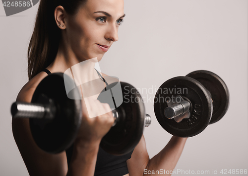 Image of Working out with dumbbels