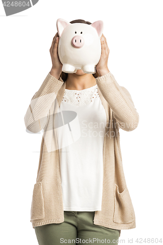 Image of Woman holding piggybank