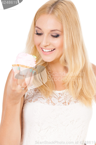 Image of Woman eating sweet cake