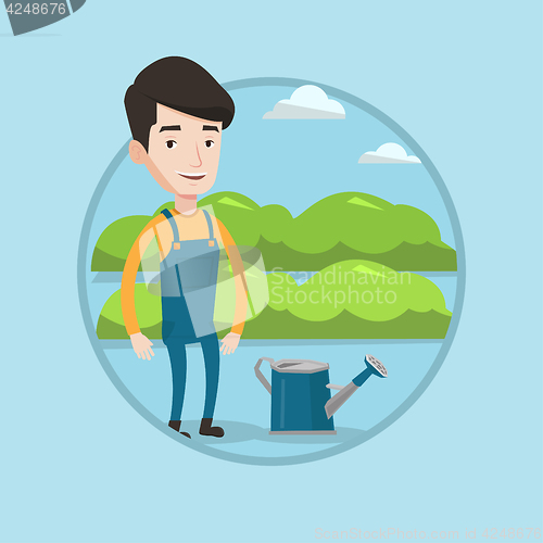 Image of Farmer with watering can at field.