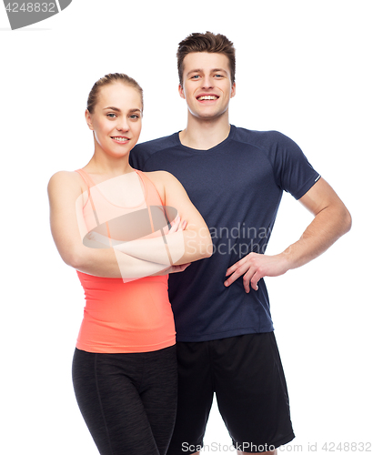 Image of happy sportive man and woman