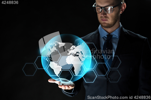 Image of close up of businessman with earth projection