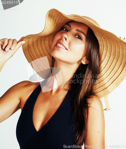 Image of young pretty brunette woman wearing summer hat and swimsuit isol