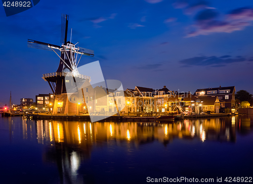 Image of Harlem landmark  windmill De Adriaan on Spaarne river. Harlem,  