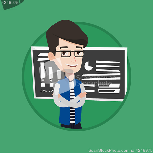 Image of Teacher or student standing in front of chalkboard