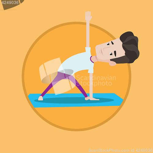 Image of Man practicing yoga triangle pose.