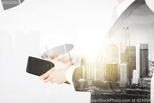 Image of close up of businessman with euro money in wallet