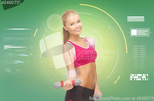 Image of happy sporty woman with dumbbells flexing biceps
