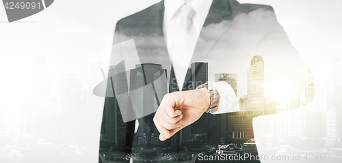 Image of close up of businessman with wristwatch