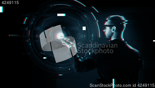Image of businessman pointing finger to virtual projection