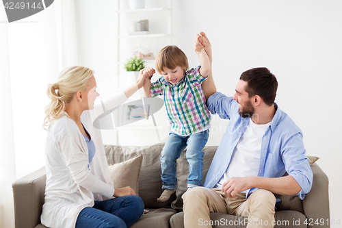 Image of happy family having fun at home