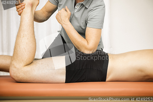 Image of young man at the physio therapy