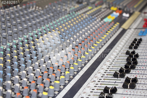 Image of Professional Sound mixing console with knobs