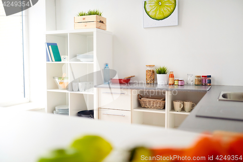 Image of modern home kitchen interior with food on table