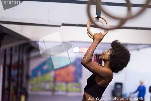 Image of black woman doing dipping exercise