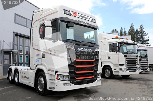 Image of New White Scania Trucks on Asphalt Yard