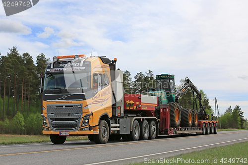 Image of Yellow Volvo FH Transports Forestry Equipment