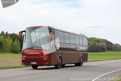 Image of Red VDL Bova Coach Bus on Road