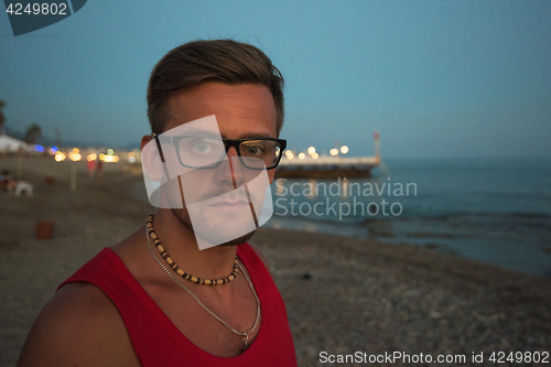 Image of man at the evening sea