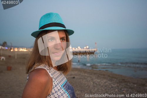 Image of beautiful woman on the beach