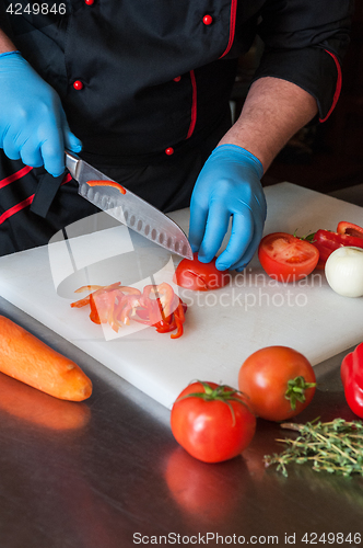 Image of Chef cutting vegetables