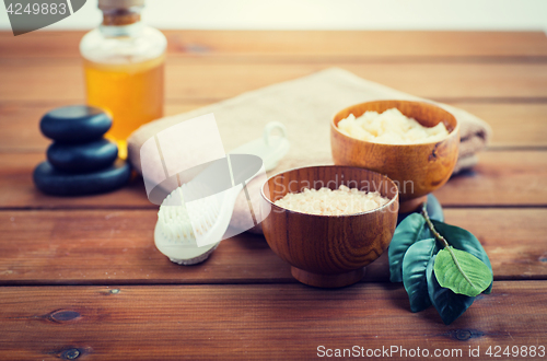 Image of close up of salt, massage oil and bath stuff