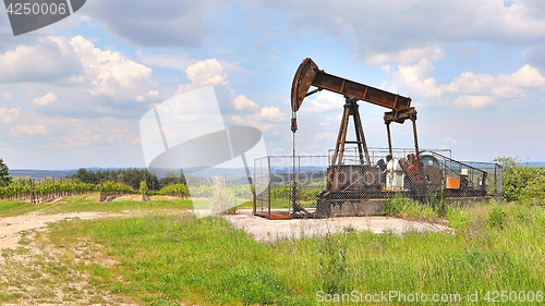 Image of Oil well on a landscape