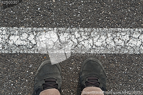 Image of Standing behind the line