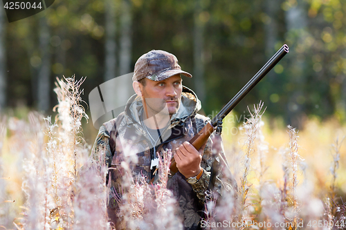 Image of hunter on the autumn hunting