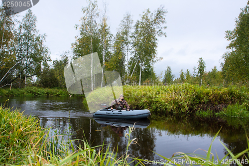 Image of Hunter in a boat