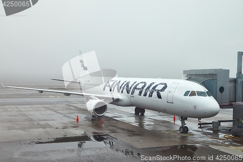 Image of Finnair plane at the airport