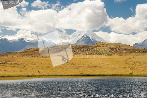 Image of Three native inhabitants