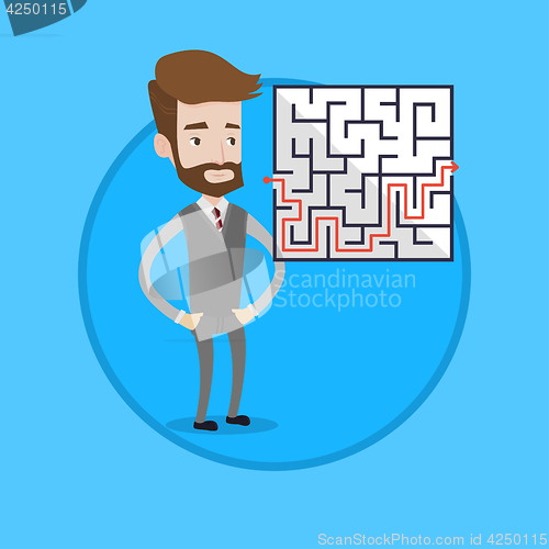 Image of Businessman looking at the labyrinth with solution