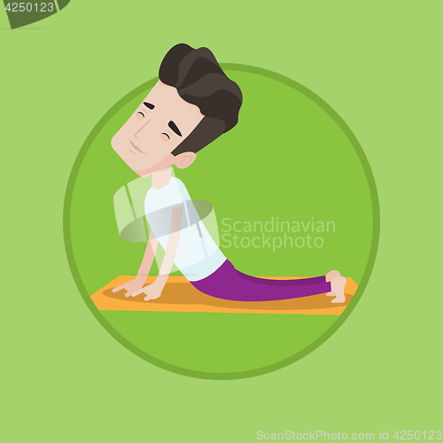 Image of Man practicing yoga upward dog pose.