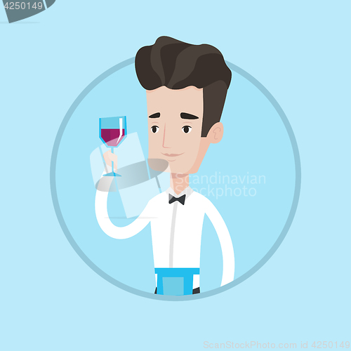 Image of Bartender holding a glass of wine in hand.