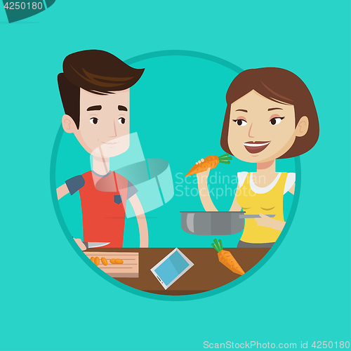 Image of Couple cooking healthy vegetable meal.