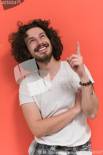 Image of young man with funny hair over color background