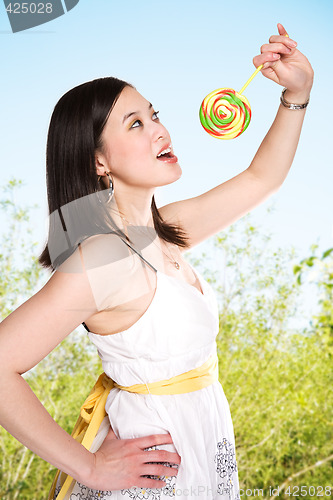 Image of Woman and lollipop