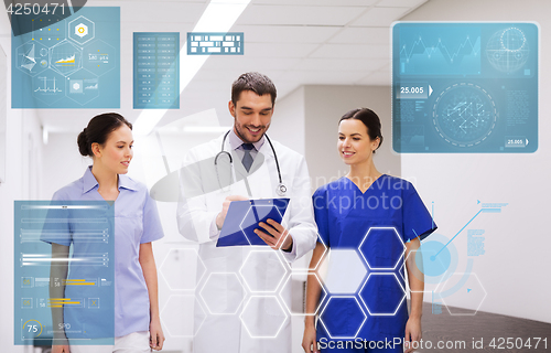 Image of group of medics at hospital with clipboard
